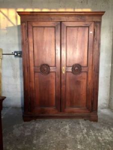 Elegant Charles X Walnut Wardrobe with Carved Central Rosettes
